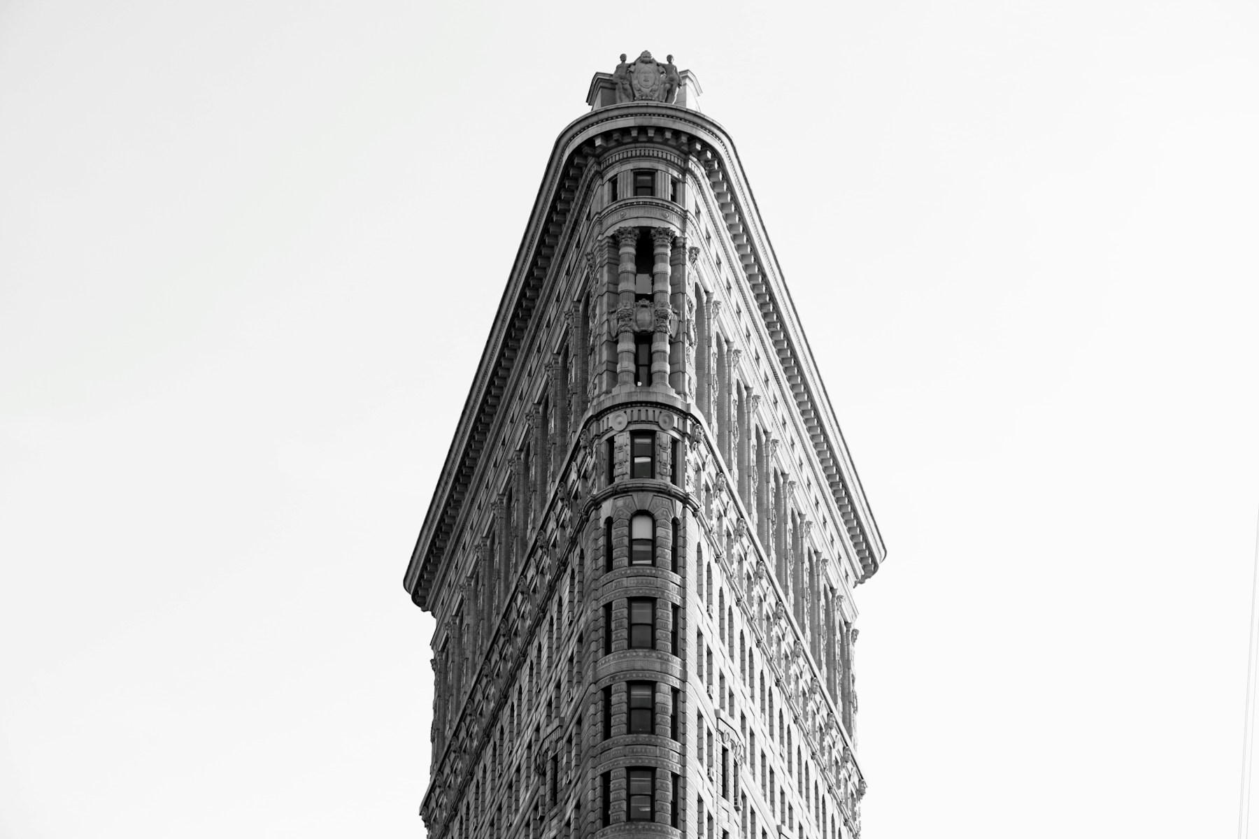 The narrow limestone facade of the Flatiron Building