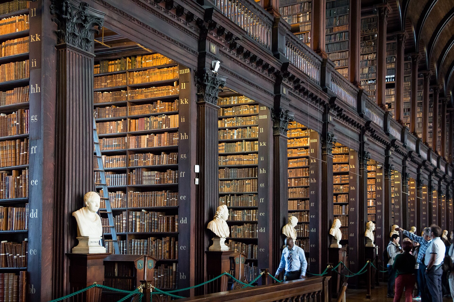 The barrel-vaulted Long Room lined with ancient books at Trinity College