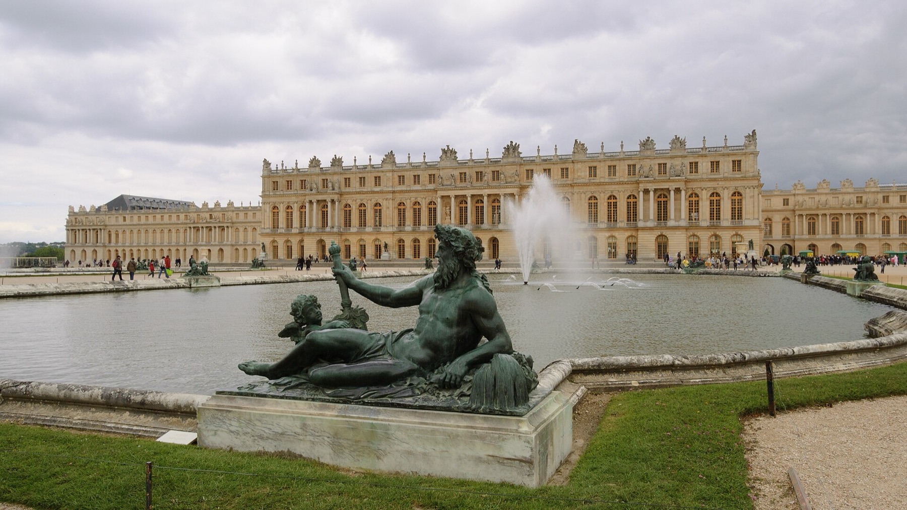 The garden facade of the Palace of Versailles under a clear sky
